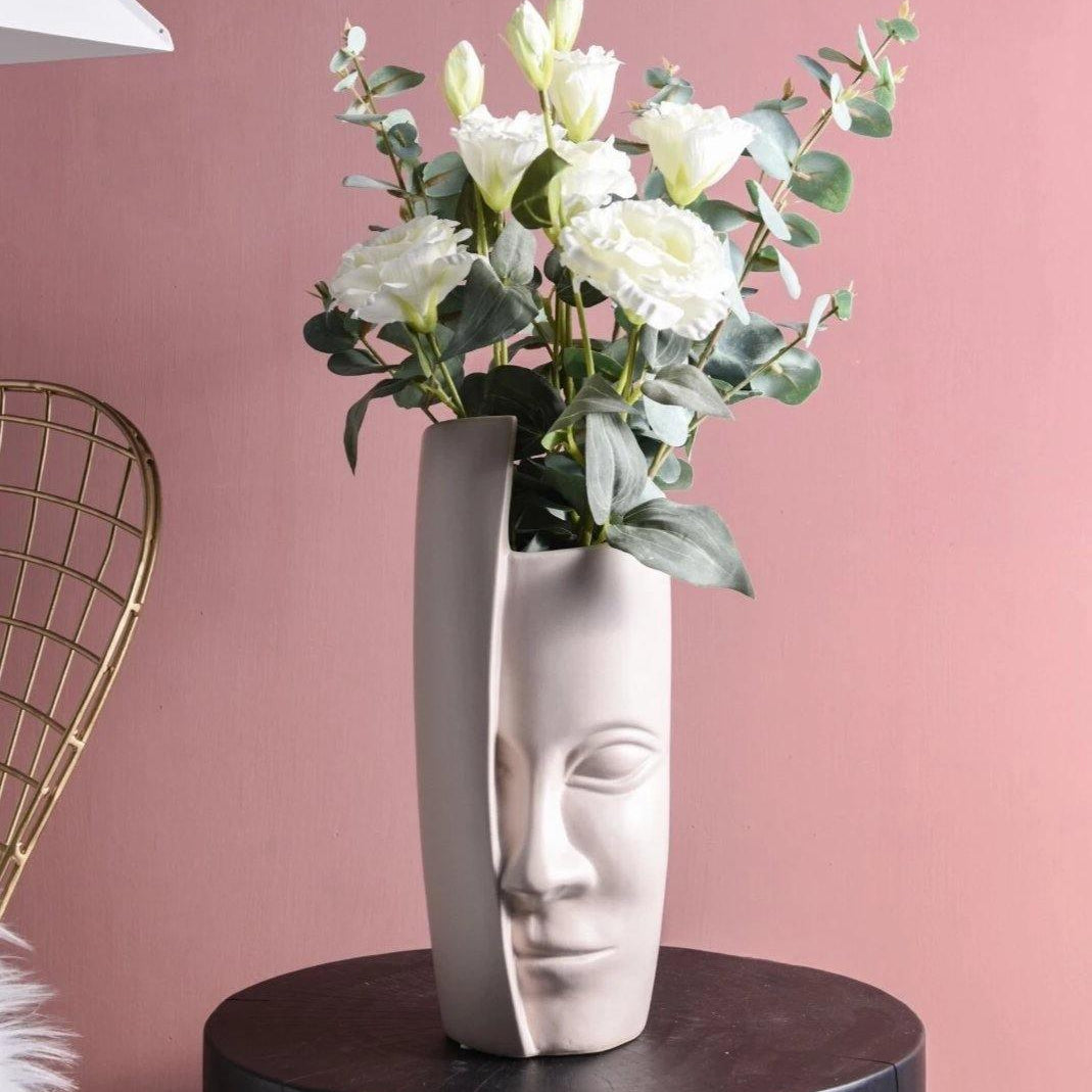 Umělecká váza s obličejem